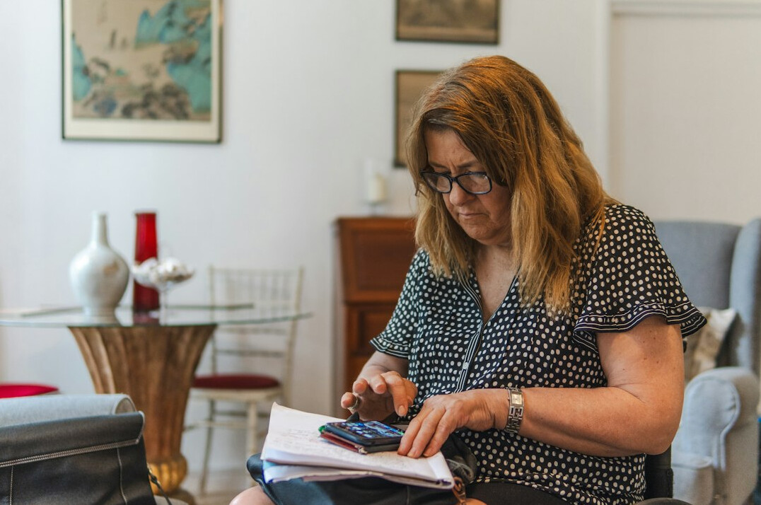 person reviewing monthly budget