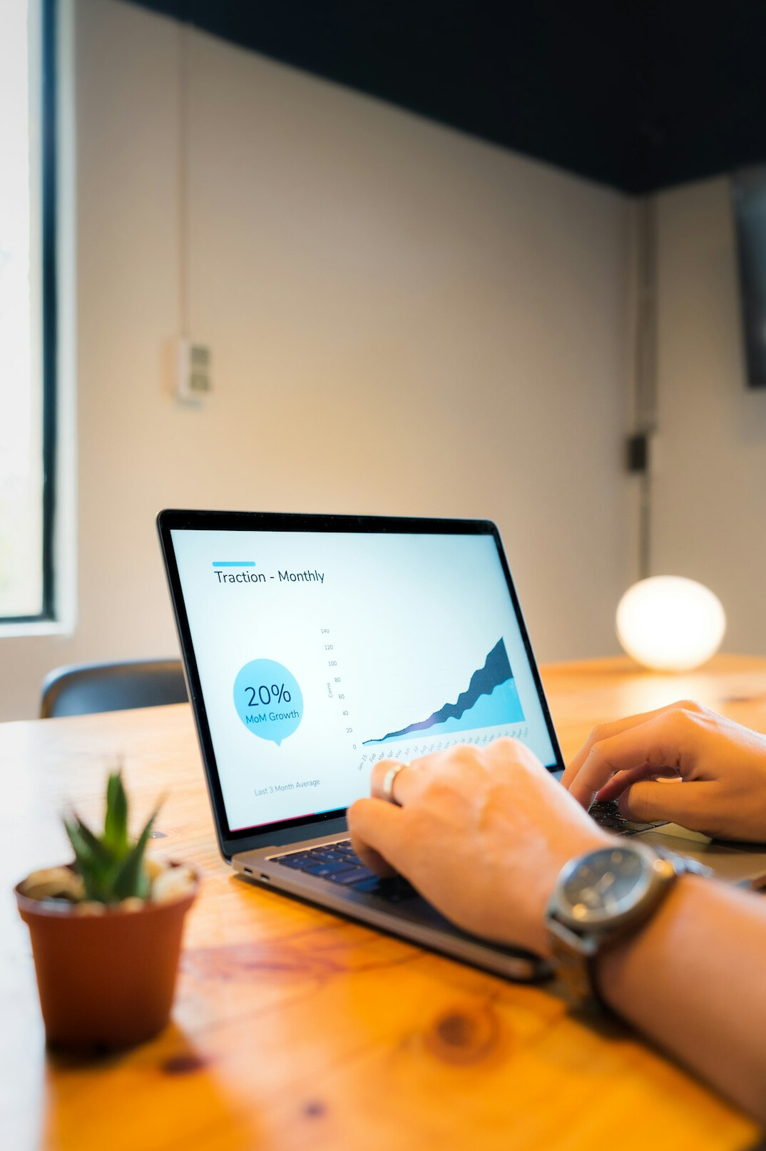 person calculating loan on computer