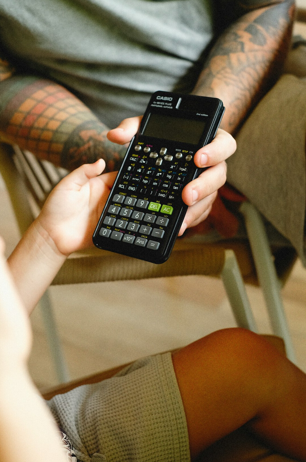 person using calculator