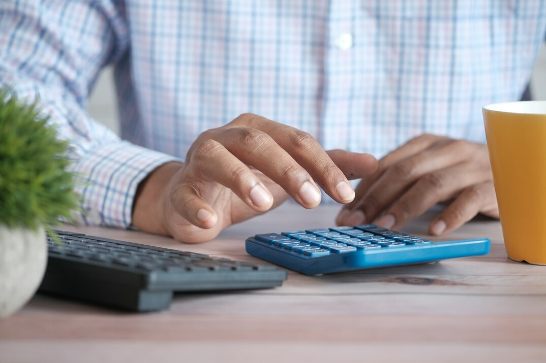 person reviewing monthly budget